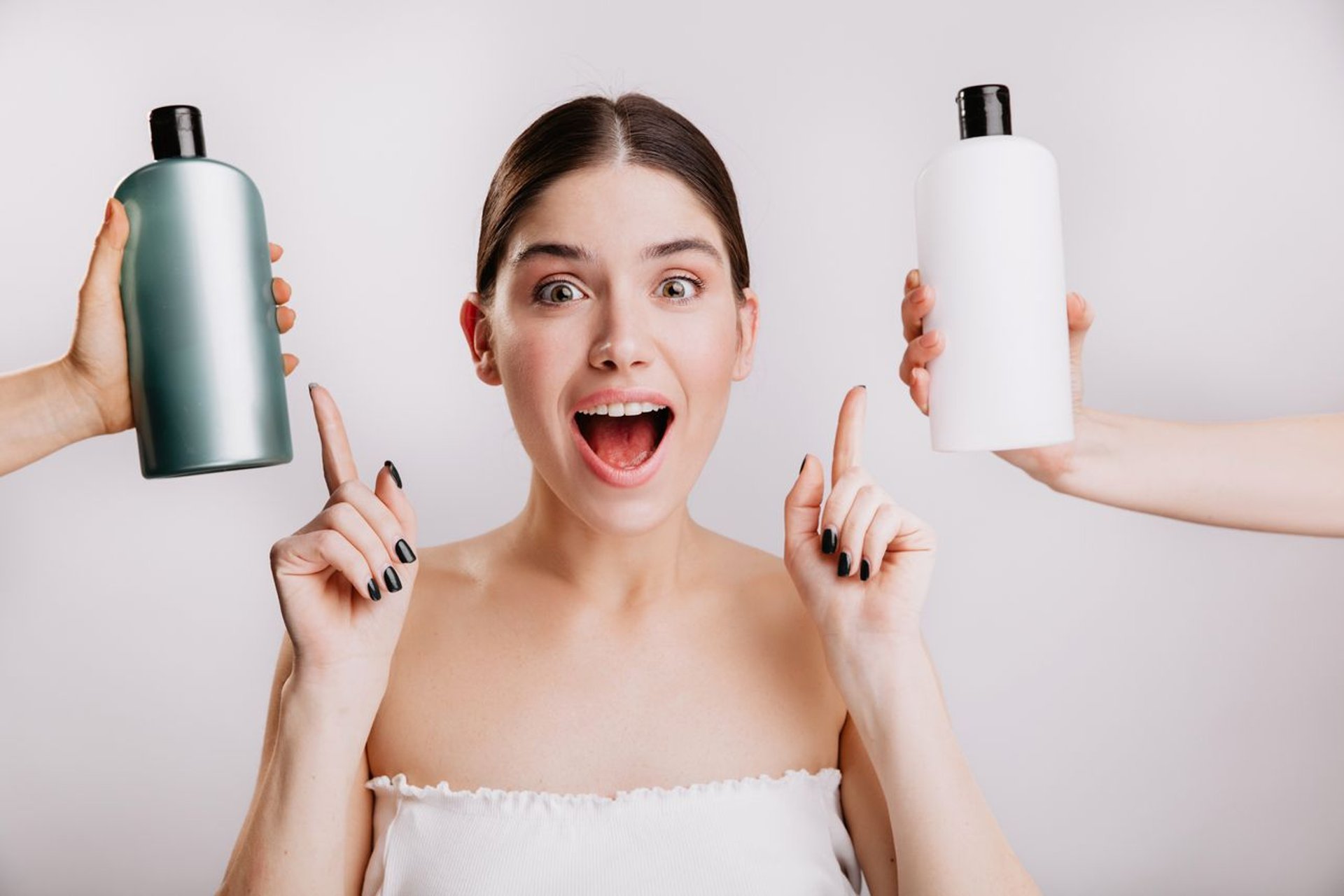 closeup-portrait-of-joyful-girl-posing-without-makeup-on-white-wall-woman-chose-which-shampoo-is-best-to-use