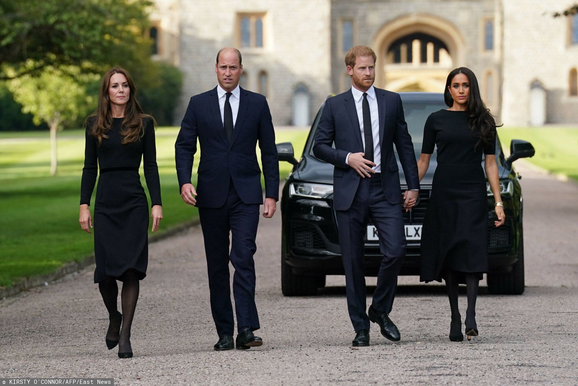 Księżna Kate, książę William, książę Harry i Meghan Markle EA