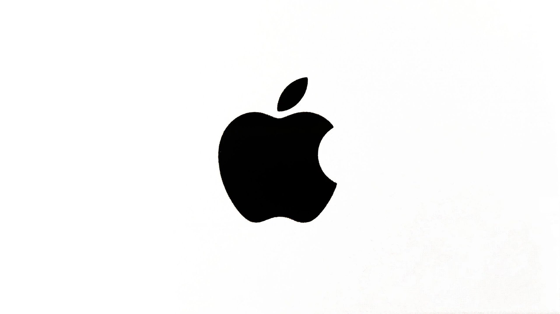 Czarne logo Apple na białym tle