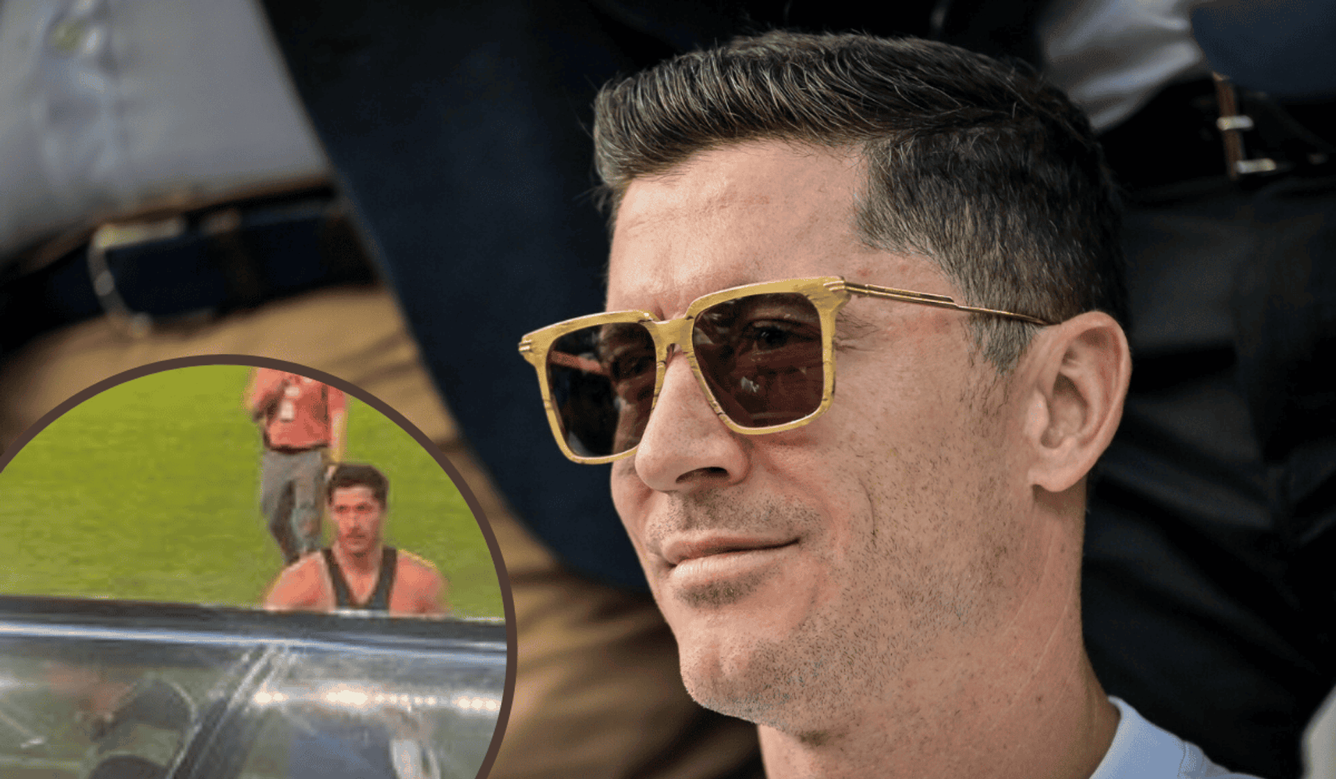 Robert Lewandowski przekazuje koszulkę kibicowi