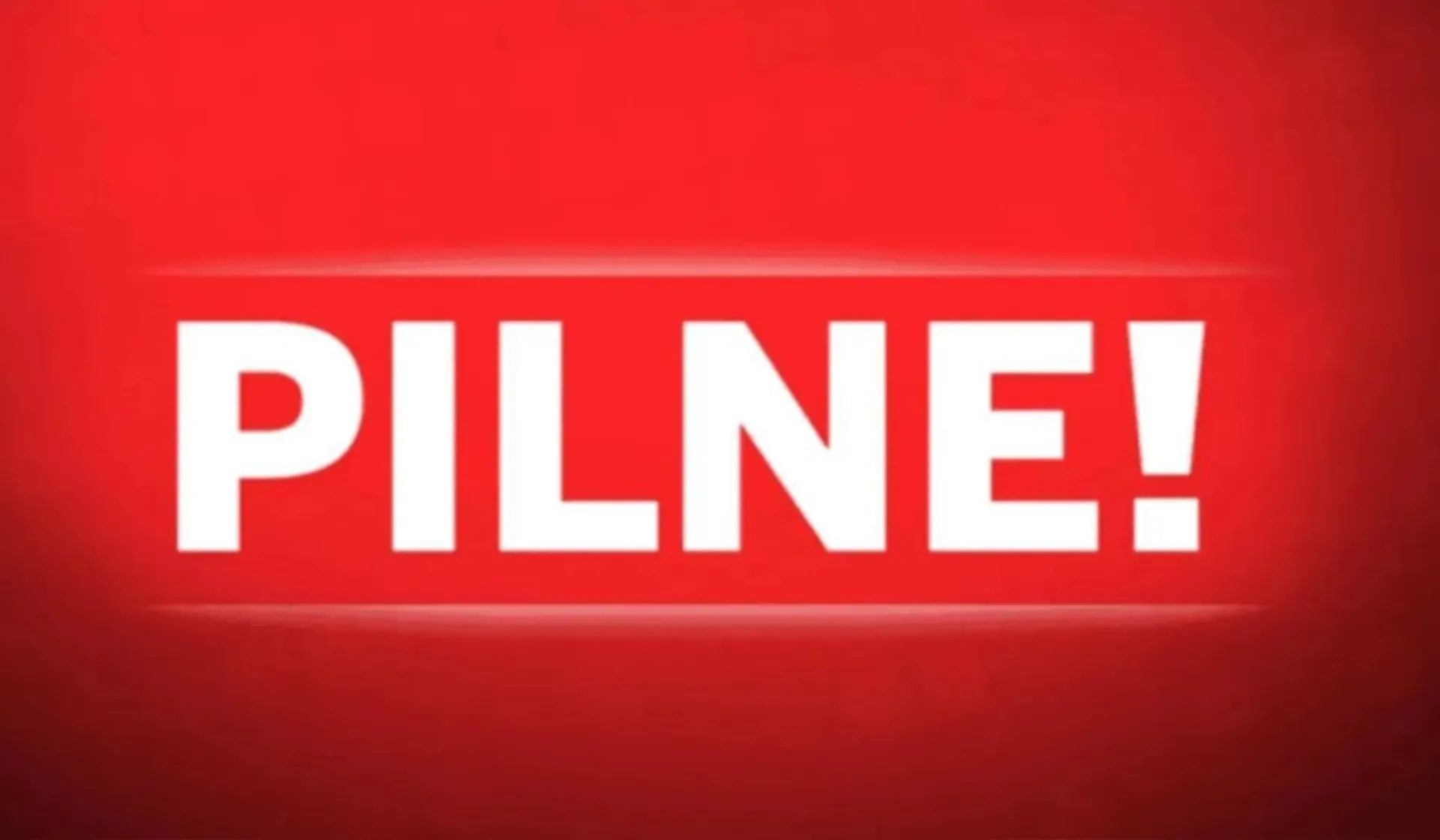 Słowo pilne na czerwonym tle