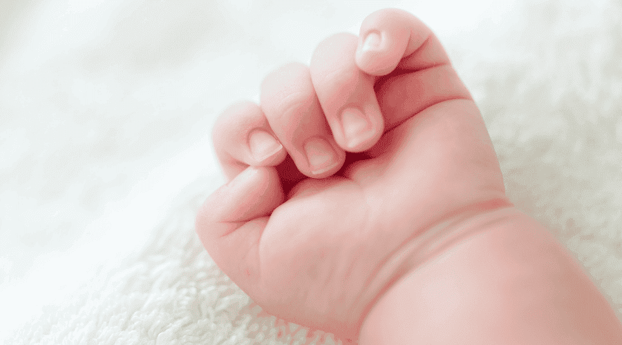 Dłoń niemowlęcia canva PRO