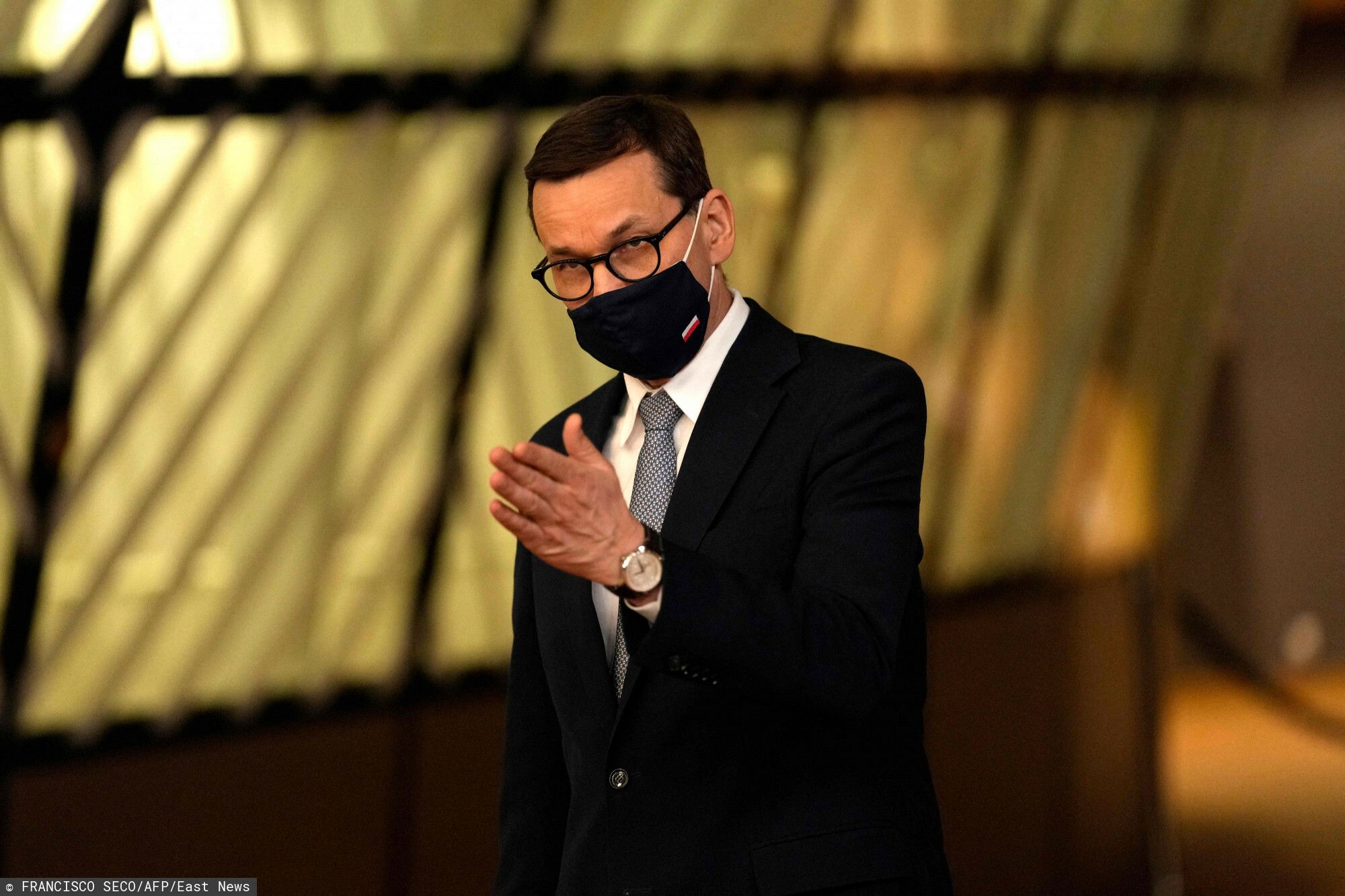 Poland's Prime Minister Mateusz Morawiecki speaks with the media as he departs at the end of the first day of the EU summit at the European Council building in Brussels on May 24, 2021. - European Union leaders take part in a two day in-person meeting to 