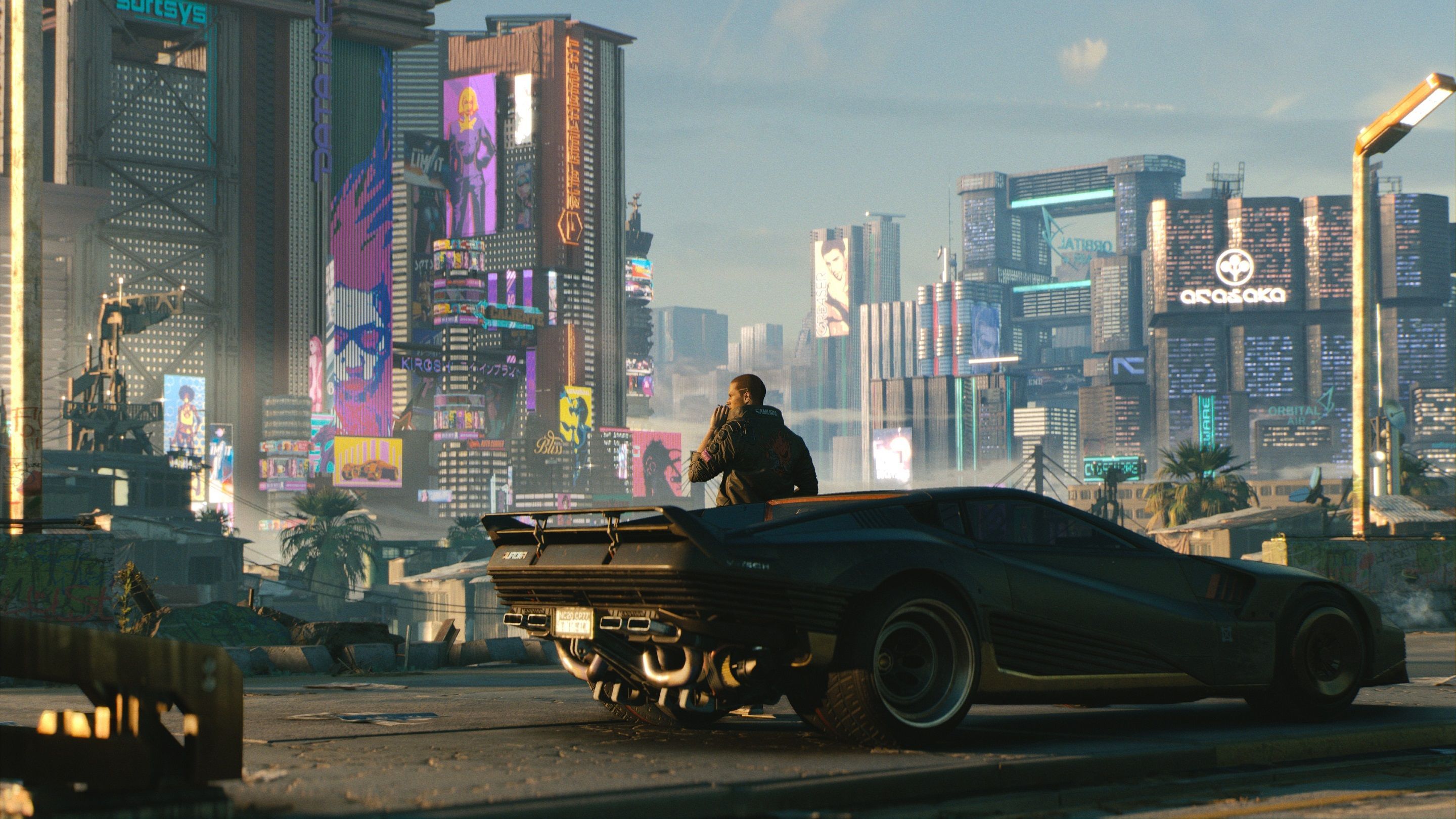 Widok na Night City zza samochodu i głównego bohatera Cyberpunk 2077
