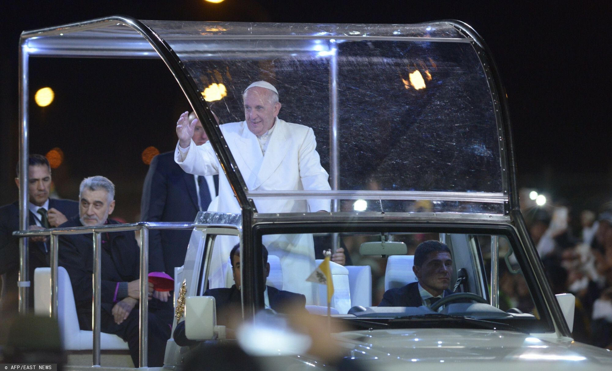 Pope Francis waves from the pope mobile during a visit at the Cambodromo in Santa Cruz, on July 8, 2015. Pope Francis, the first Latin American pontiff, arrived in Bolivia on the second leg of a three-nation tour of the continent's poorest countries, wher