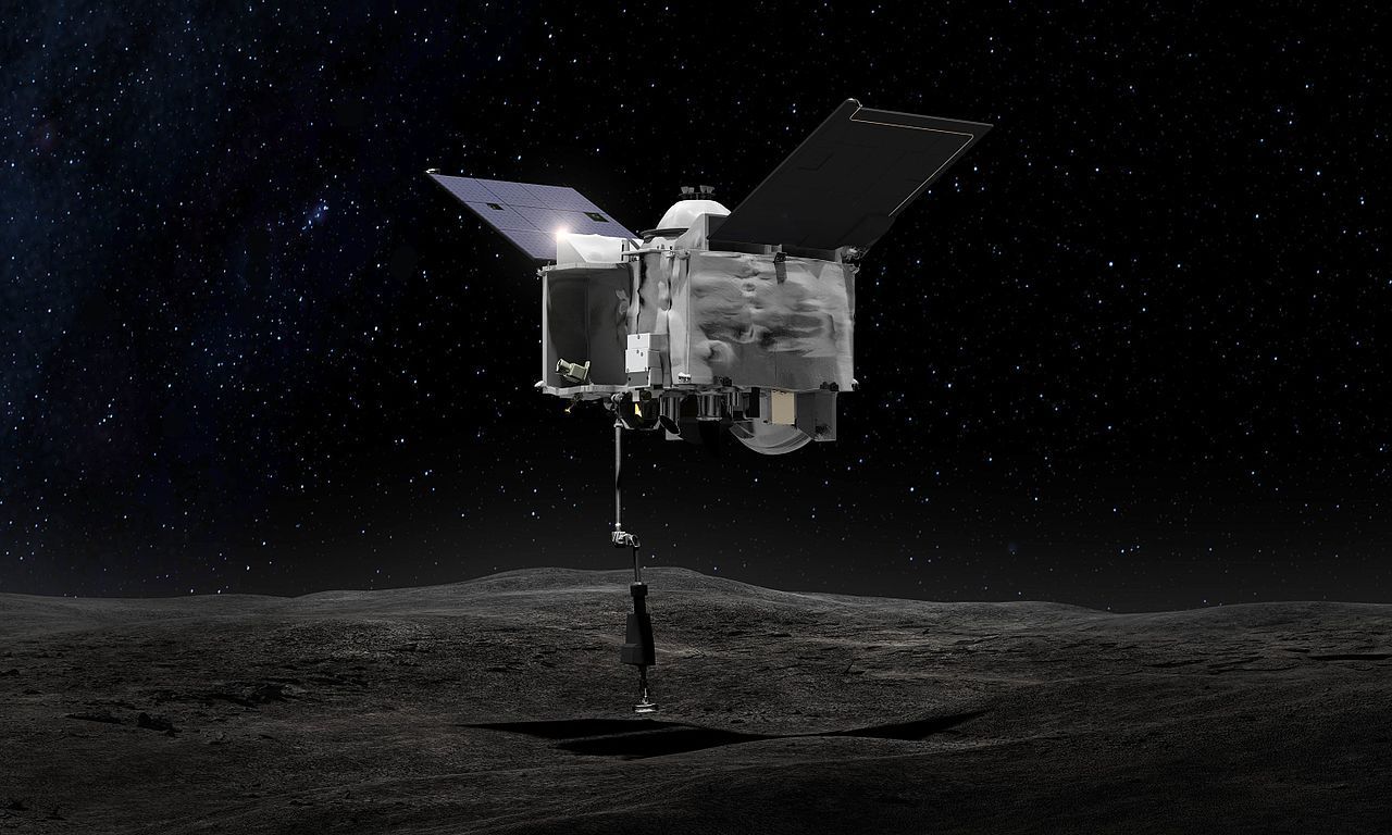 Grafika koncepcyjna lądowania sondy OSIRIS-REx na asteroidzie Bennu.