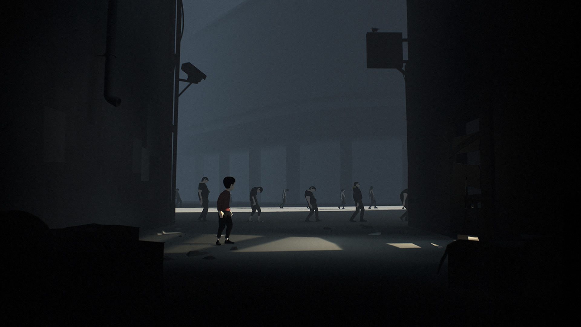 Screen z gry Inside przedstawiający bohatera na tle ludzkich zombie