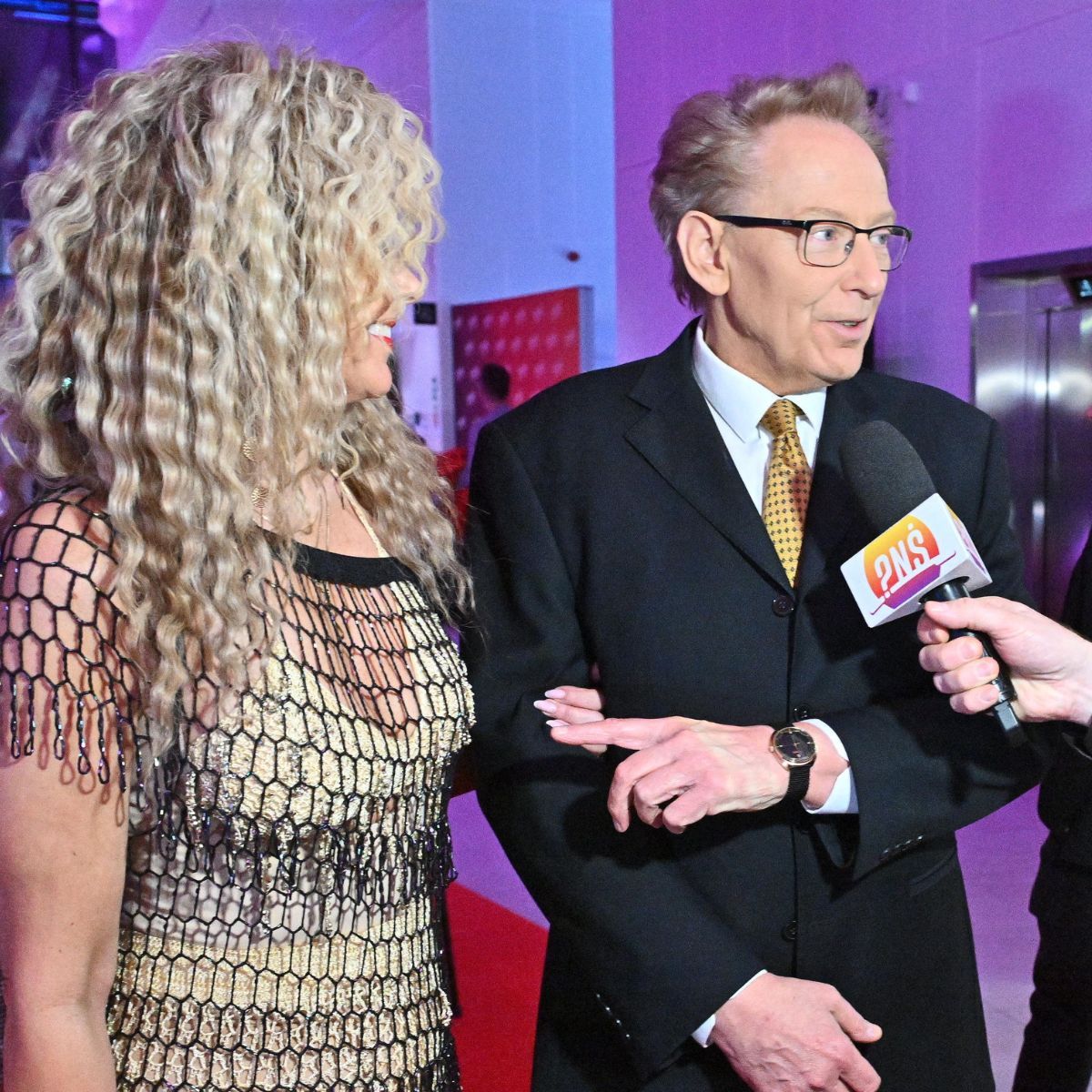 Żona Jacka Borowskiego w siatce na ściance. Nikt nawet nie zwrócił uwagi na aktora