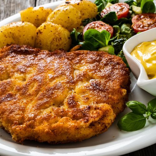 Wymieszaj z musztardą i zalej nią kotlety. Schabowe będą bosko soczyste