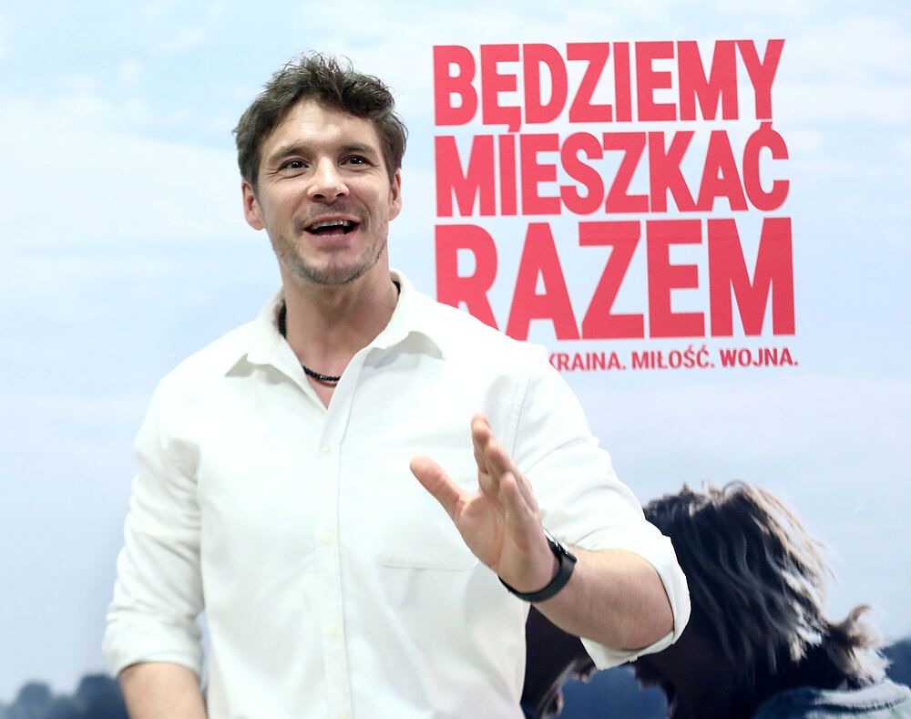 Mikołaj Roznerski, zdjęcie z niemowlakiem, film 