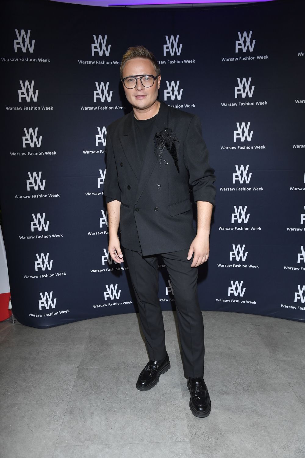 Gwiazdy na Warsaw Fashion Week. Krzysztof Ibisz, Caroline Derpienski, Jakub i Paulina Rzeźniczakowie