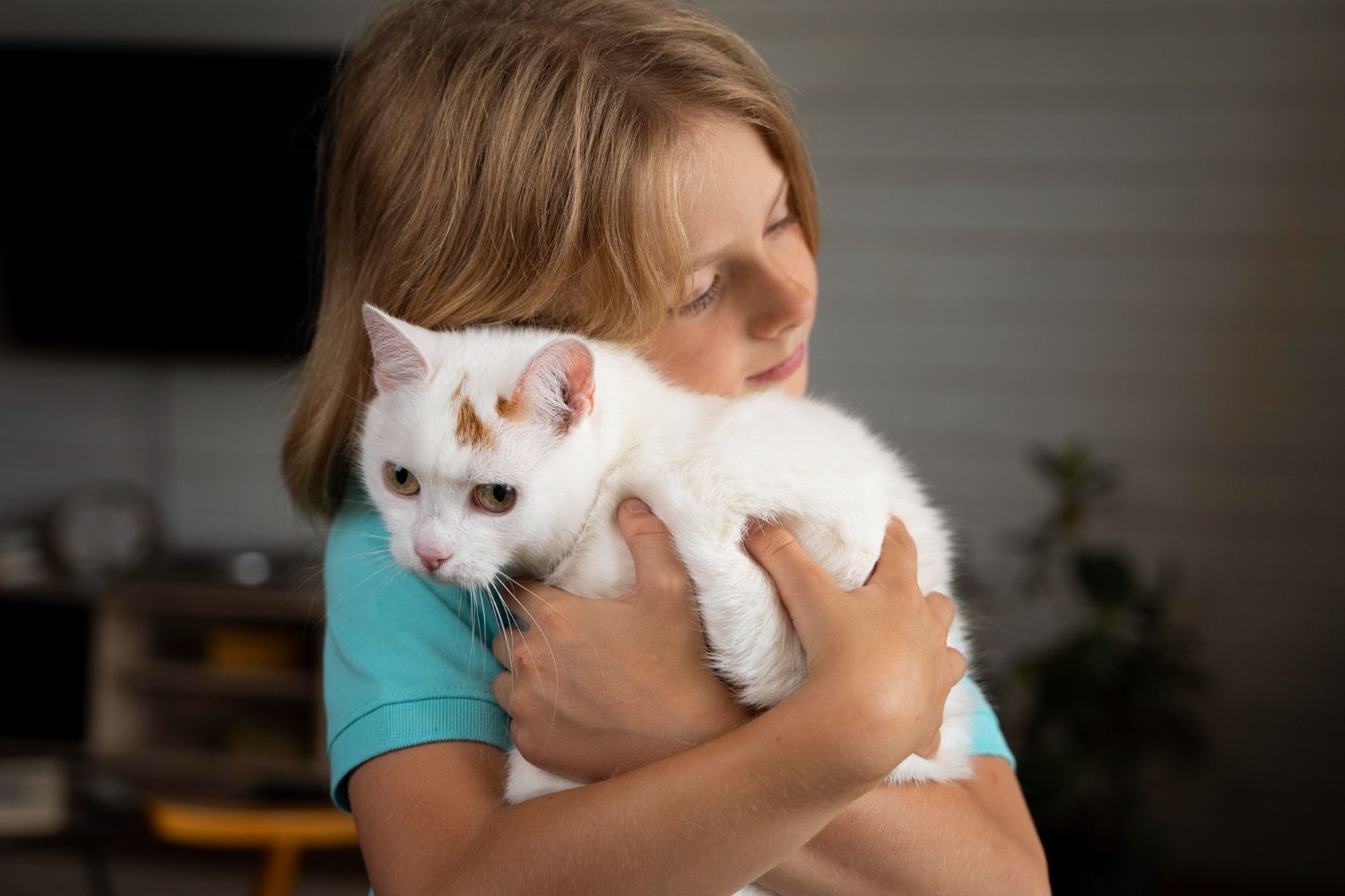 medium-shot-kid-hugging-cat.jpg