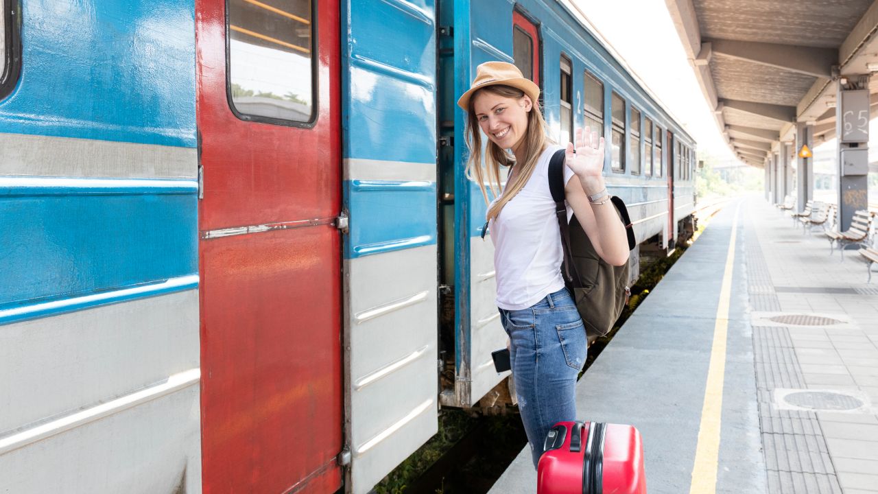 woman-traveller-ready-take-train.jpg